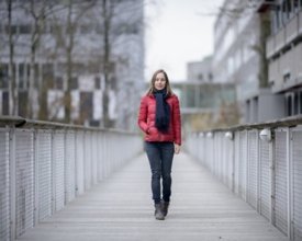 Clara walking on UT campus