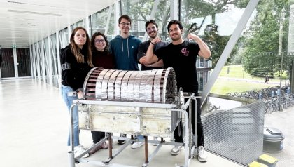 five AOT students with the artificial kidney