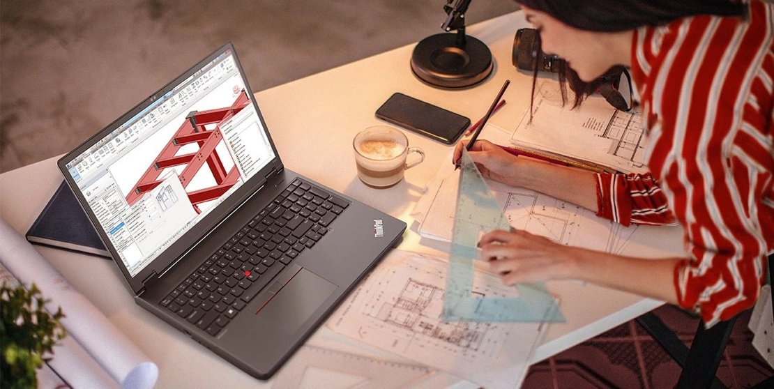 A woman working with architectural designs on Lenovo ThinkPad L16 P16v G2 mobile workstation.